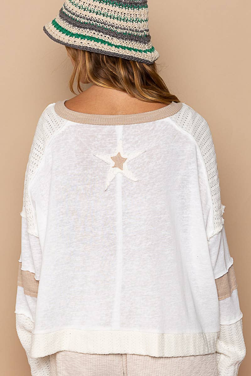 Star patch long sleeve cropped knit top